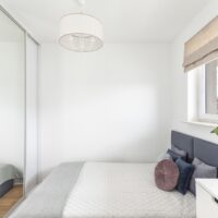 https://img.asariweb.pl/original/kawalerka bemowo mieszkanie lazurowa apartamentowiec budynek apartamentowy przestronna jasna sypialnia łóżko